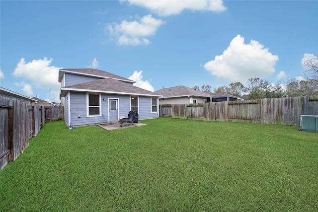 24715 Winema Woods Ln, Huffman, TX 77336 - back of property with a fenced backyard and a patio area