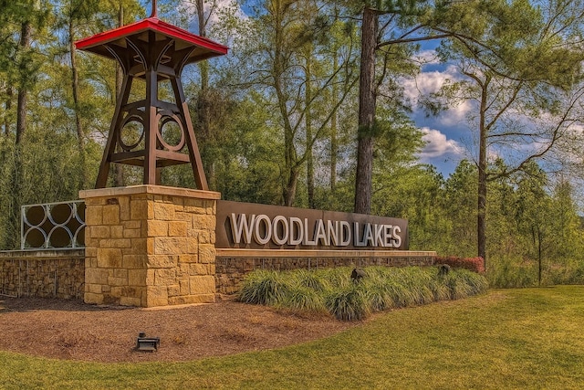 24715 Winema Woods Ln, Huffman, TX 77336 - community / neighborhood sign featuring a lawn
