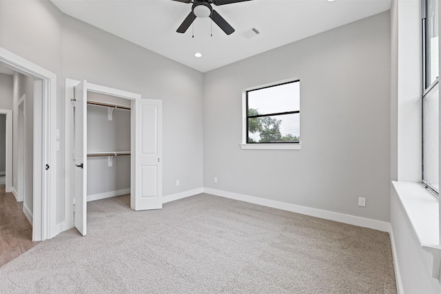 806 E 39th St Unit A, Houston, TX 77022 - unfurnished bedroom with carpet, a closet, and ceiling fan
