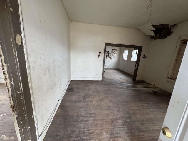 509 N Waggoner St, Electra, TX 76360 - empty room featuring vaulted ceiling and wood finished floors