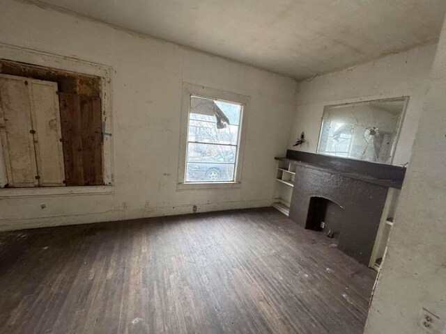 509 N Waggoner St, Electra, TX 76360 - unfurnished living room featuring hardwood / wood-style flooring