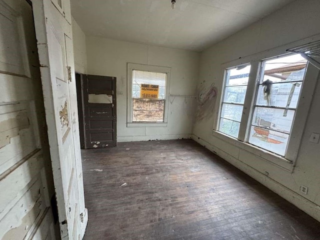 509 N Waggoner St, Electra, TX 76360 - unfurnished room featuring wood finished floors