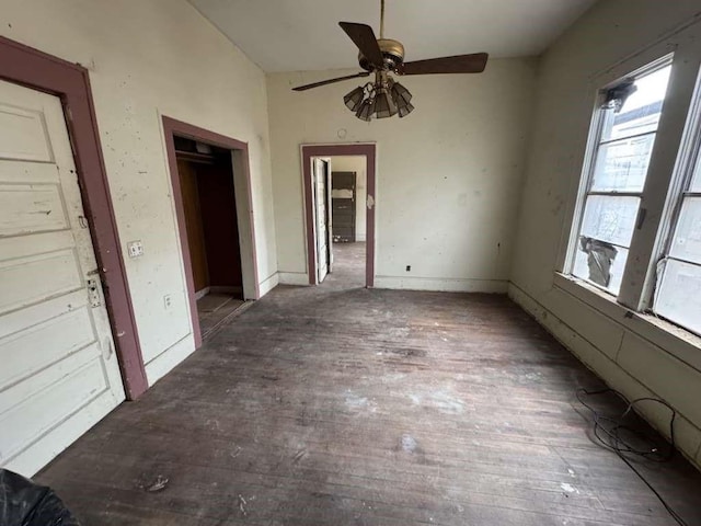 509 N Waggoner St, Electra, TX 76360 - unfurnished dining area with a ceiling fan, healthy amount of natural light, and hardwood / wood-style floors