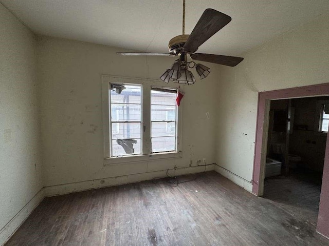 509 N Waggoner St, Electra, TX 76360 - unfurnished room with wood finished floors and ceiling fan