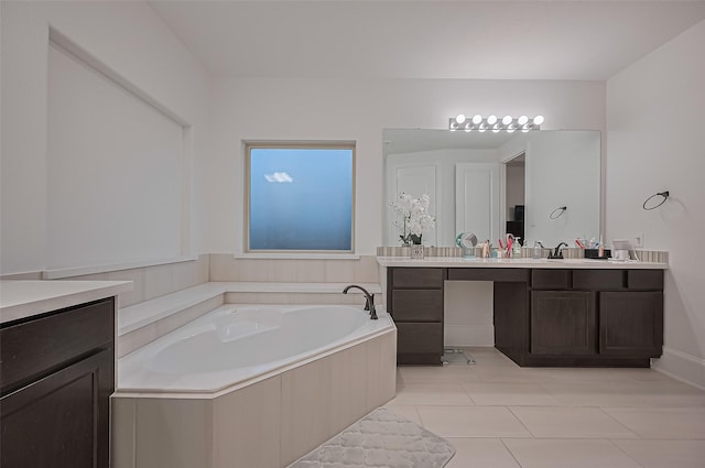 9011 Bright Harbor Dr, Cypress, TX 77433 - bathroom featuring vanity, a bath, and tile patterned floors