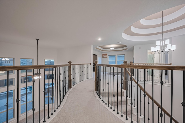 9011 Bright Harbor Dr, Cypress, TX 77433 - hall with a raised ceiling, an upstairs landing, a chandelier, carpet flooring, and recessed lighting