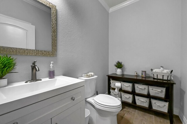25119 Dunbrook Springs Ln, Katy, TX 77494 - half bath with ornamental molding, vanity, and wood finished floors