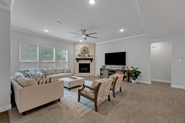 25119 Dunbrook Springs Ln, Katy, TX 77494 - living area featuring ornamental molding, a ceiling fan, a large fireplace, and recessed lighting
