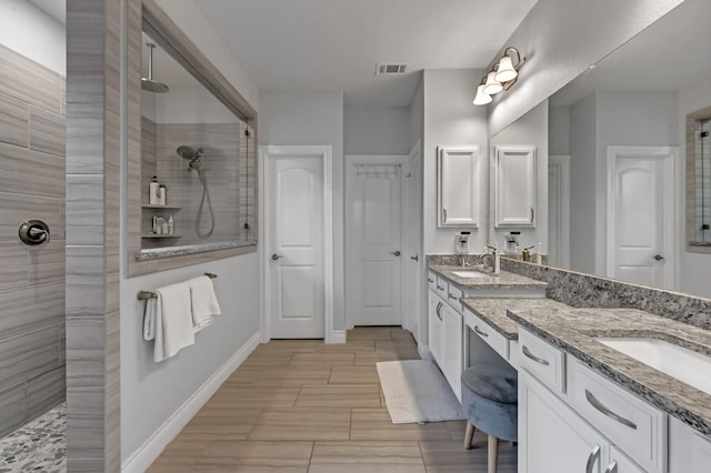 25119 Dunbrook Springs Ln, Katy, TX 77494 - bathroom with a walk in shower and double vanity