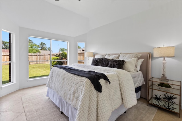 10039 Briarpark Trail Ln, Houston, TX 77064 - bedroom with tile patterned flooring and lofted ceiling