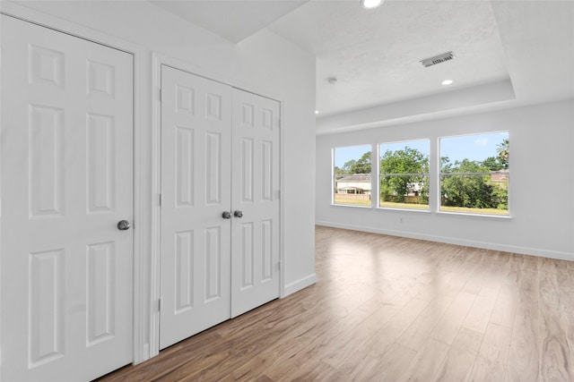 10039 Briarpark Trail Ln, Houston, TX 77064 - unfurnished bedroom featuring recessed lighting, wood finished floors, and a closet