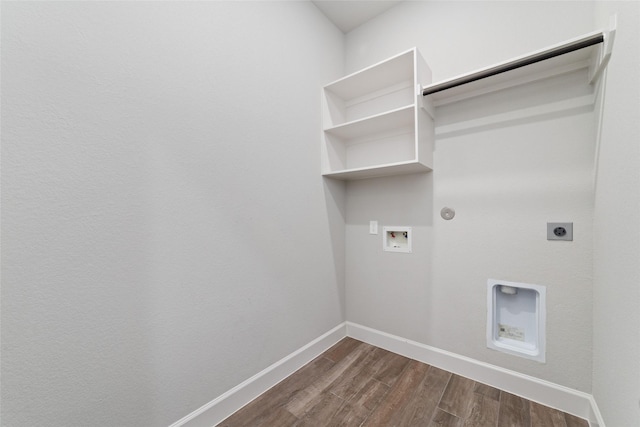 18402 Ingliston Ln, Richmond, TX 77407 - washroom featuring electric dryer hookup, dark wood finished floors, hookup for a washing machine, and hookup for a gas dryer