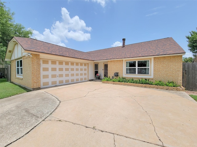 17602 Kakerglen Ct, Houston, TX 77084 - ranch-style house featuring brick siding, driveway, a garage, and a shingled roof