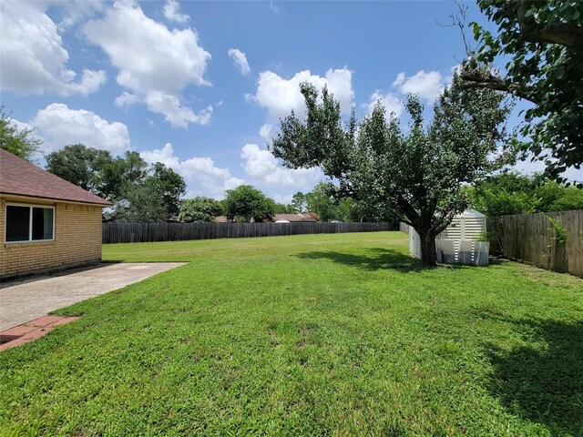 17602 Kakerglen Ct, Houston, TX 77084 - fenced backyard with a patio area