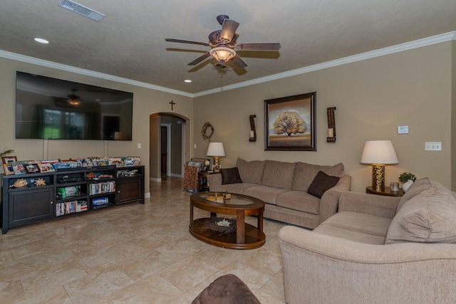 5720 Sunbird Ln, Beaumont, TX 77708 - living room with arched walkways, ceiling fan, ornamental molding, and recessed lighting