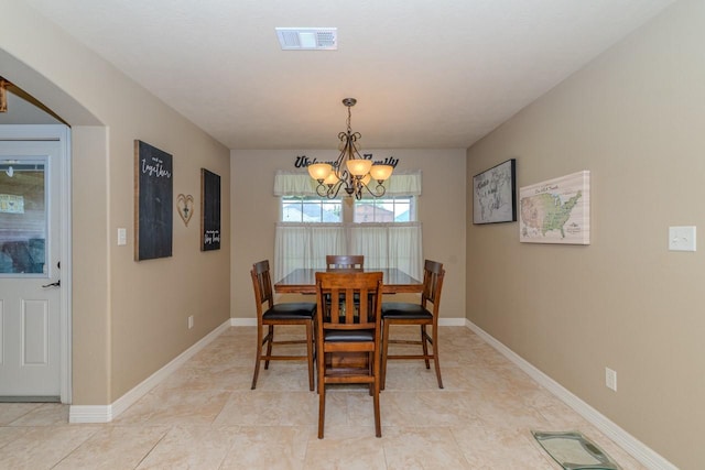 5720 Sunbird Ln, Beaumont, TX 77708 - dining space with a chandelier and baseboards