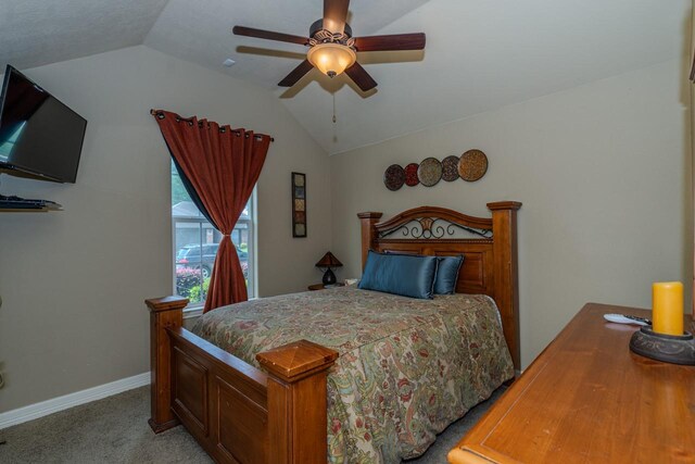 5720 Sunbird Ln, Beaumont, TX 77708 - bedroom featuring vaulted ceiling, light carpet, and a ceiling fan