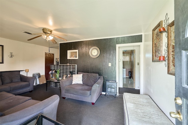 3214 Stallings Dr, Houston, TX 77088 - living room with a ceiling fan and dark colored carpet
