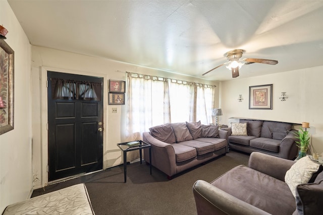 3214 Stallings Dr, Houston, TX 77088 - living room featuring ceiling fan and dark carpet