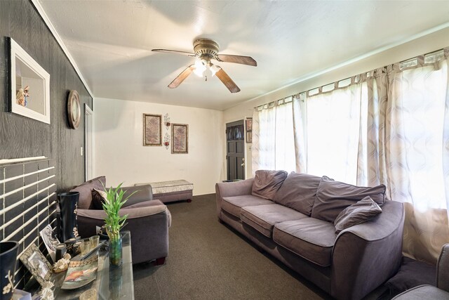 3214 Stallings Dr, Houston, TX 77088 - carpeted living area featuring ceiling fan