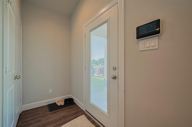 6418 Gresham St, Wallis, TX 77485 - entryway featuring dark wood-type flooring and baseboards