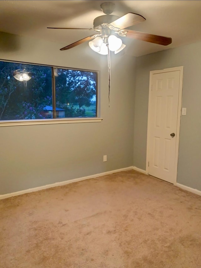 16510 De Lozier St, Jersey Village, TX 77040 - carpeted empty room with baseboards and a ceiling fan