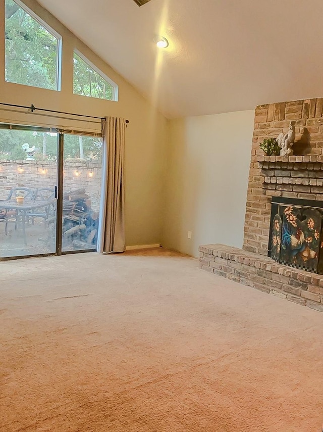 16510 De Lozier St, Jersey Village, TX 77040 - unfurnished living room with carpet, lofted ceiling, and a brick fireplace