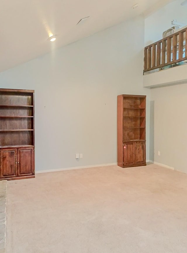 16510 De Lozier St, Jersey Village, TX 77040 - unfurnished living room with high vaulted ceiling and carpet flooring