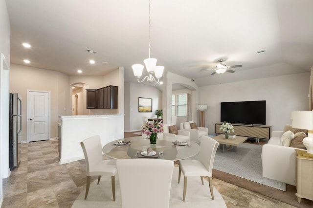 10750 Nathaniel Valley Path, Houston, TX 77016 - dining room featuring arched walkways, a ceiling fan, recessed lighting, and a chandelier