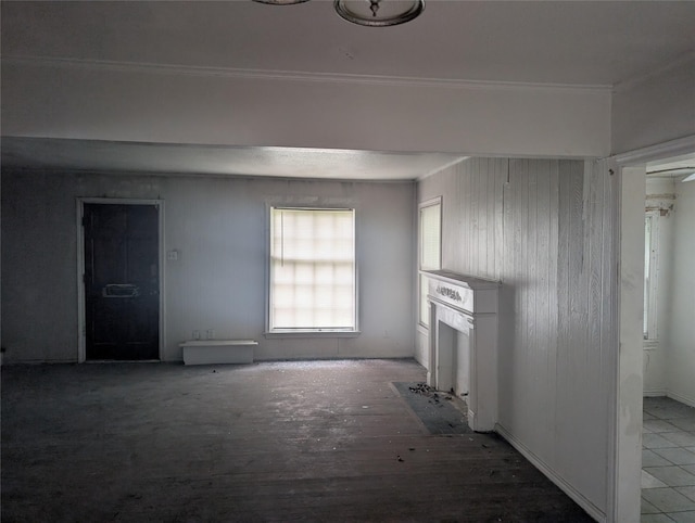 8343 Bonner, Houston, TX 77017 - unfurnished living room featuring a fireplace with flush hearth and ornamental molding