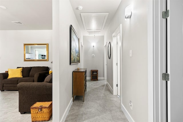 224 Evergreen Dr, Huntsville, TX 77340 - hallway featuring attic access and baseboards