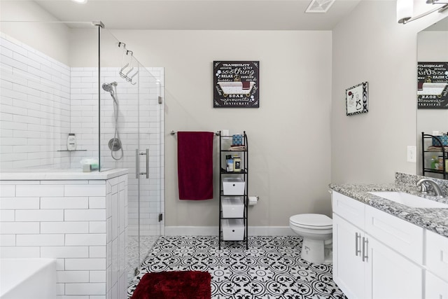 224 Evergreen Dr, Huntsville, TX 77340 - full bathroom featuring a shower stall, vanity, tile patterned floors, and a tub to relax in