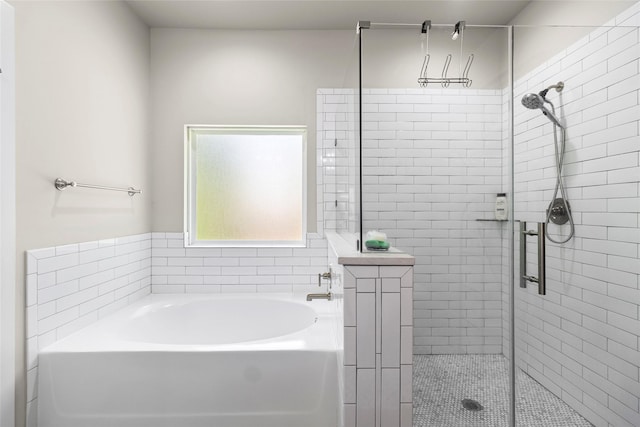 224 Evergreen Dr, Huntsville, TX 77340 - bathroom featuring a shower stall and a bath