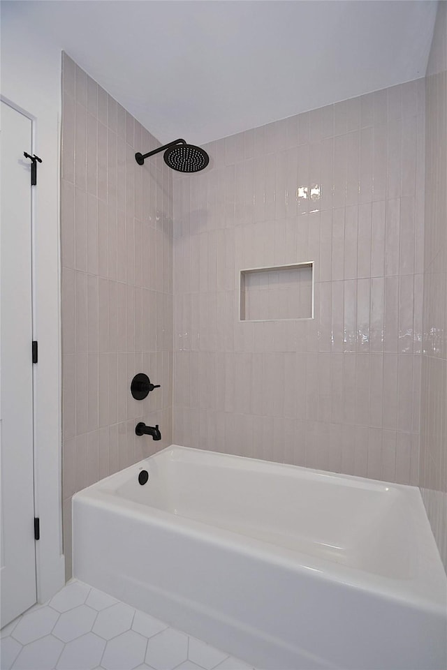 5330 Dumfries Dr, Houston, TX 77096 - bathroom featuring bathing tub / shower combination and tile patterned flooring