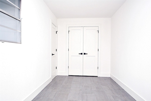 5330 Dumfries Dr, Houston, TX 77096 - unfurnished bedroom with baseboards and a closet