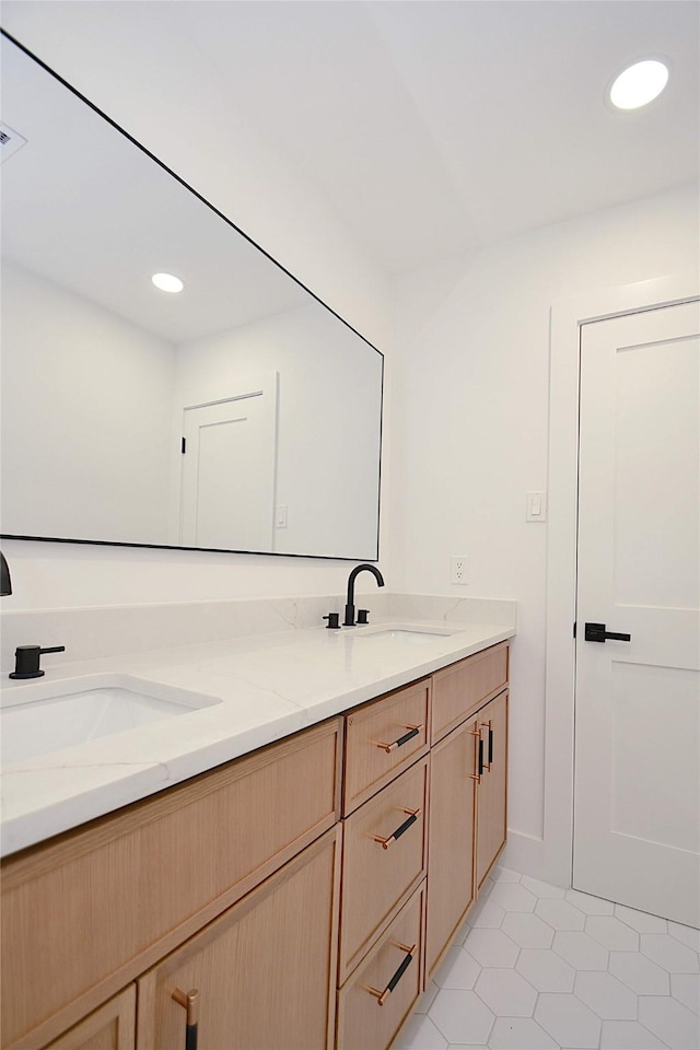 5330 Dumfries Dr, Houston, TX 77096 - bathroom featuring double vanity, tile patterned flooring, and recessed lighting