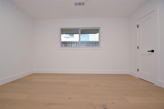 5330 Dumfries Dr, Houston, TX 77096 - empty room featuring light wood-type flooring and baseboards