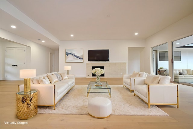 5330 Dumfries Dr, Houston, TX 77096 - living area featuring wood finished floors and recessed lighting