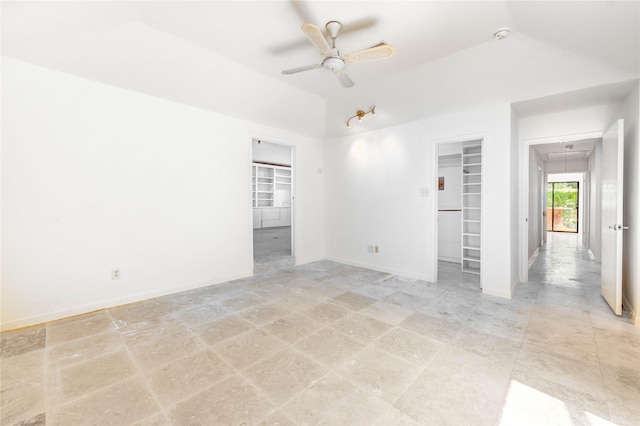 3831 Wood Stone Walk Dr, Houston, TX 77084 - spare room featuring attic access, ceiling fan, and vaulted ceiling