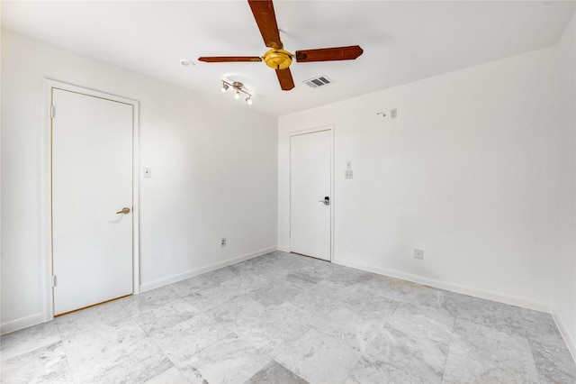 3831 Wood Stone Walk Dr, Houston, TX 77084 - spare room featuring a ceiling fan and baseboards