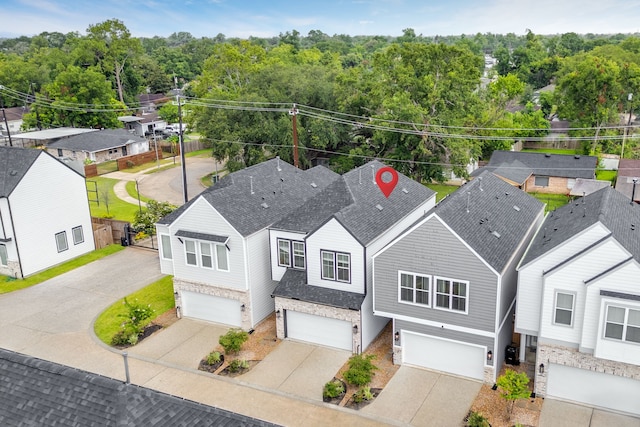 413 Stonework Oaks Ln, Houston, TX 77076 - view from above of property with a heavily wooded area