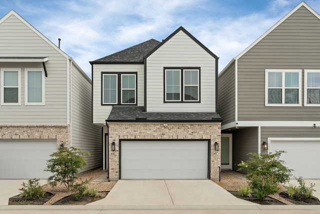 413 Stonework Oaks Ln, Houston, TX 77076 - view of front facade featuring brick siding, a garage, driveway, and a shingled roof