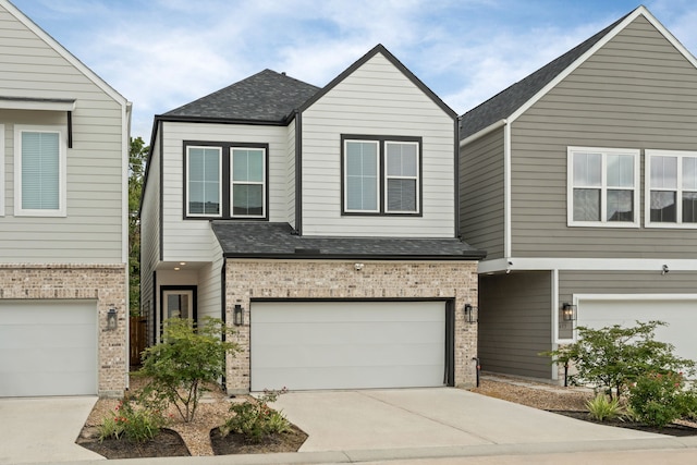 413 Stonework Oaks Ln, Houston, TX 77076 - view of front facade featuring brick siding, a garage, concrete driveway, and a shingled roof