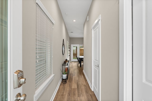 413 Stonework Oaks Ln, Houston, TX 77076 - hall featuring wood finished floors and recessed lighting