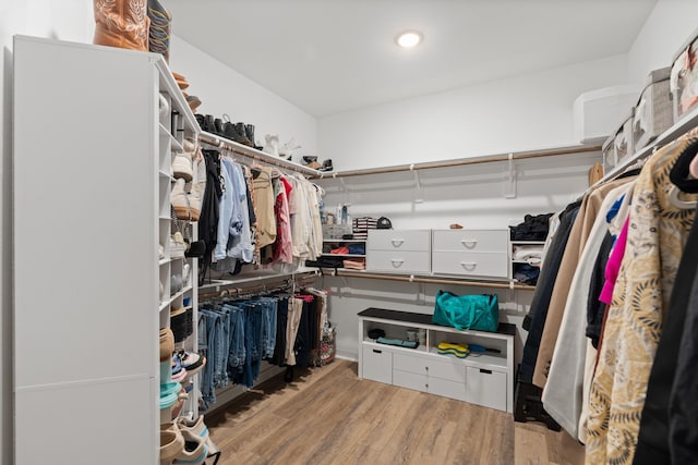 413 Stonework Oaks Ln, Houston, TX 77076 - spacious closet featuring wood finished floors