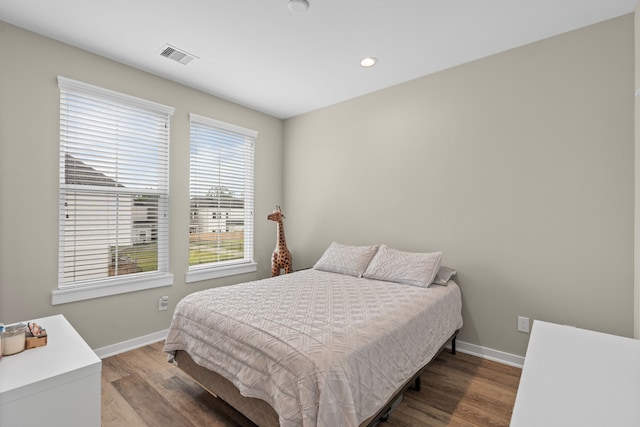 413 Stonework Oaks Ln, Houston, TX 77076 - bedroom with recessed lighting and wood finished floors