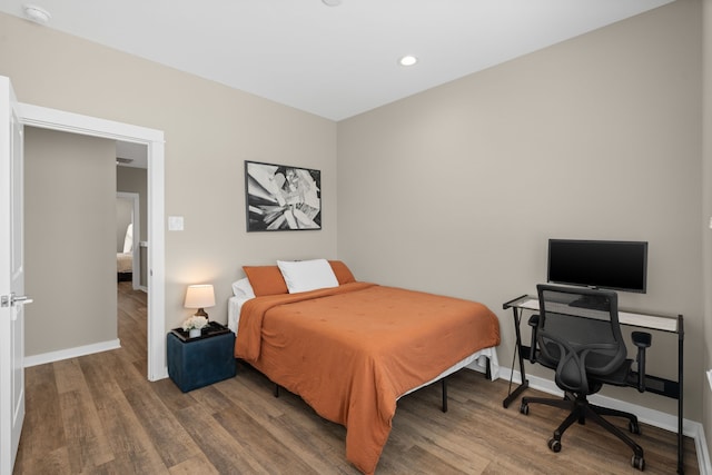 413 Stonework Oaks Ln, Houston, TX 77076 - bedroom featuring wood finished floors and recessed lighting