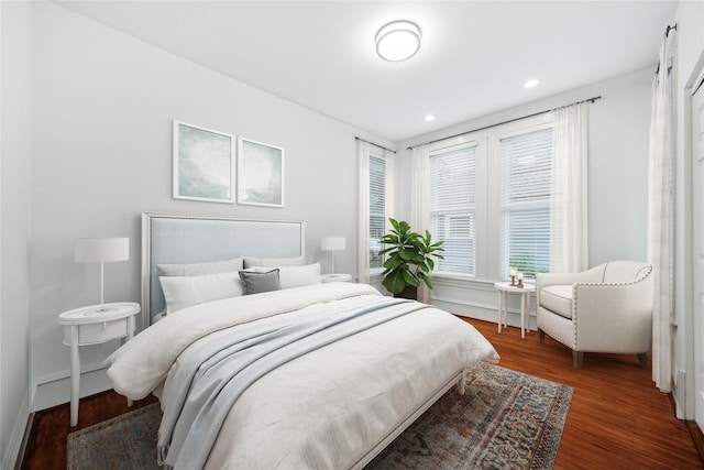 208 E 12th St, Houston, TX 77008 - bedroom with wood finished floors and recessed lighting