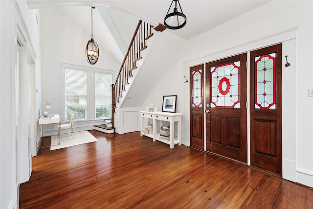 208 E 12th St, Houston, TX 77008 - foyer with stairs, wood finished floors, a chandelier, and lofted ceiling