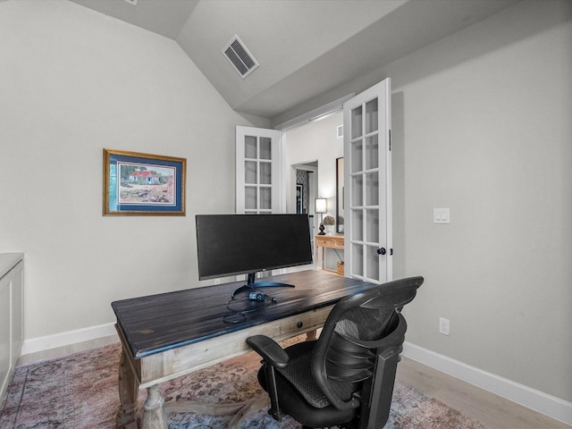 706 Westwood Dr, League City, TX 77573 - office featuring wood finished floors, vaulted ceiling, and french doors